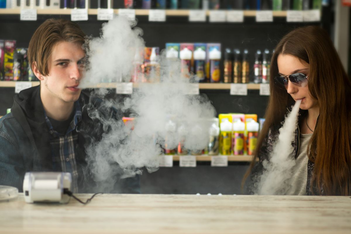 Two guys enjoying vaping